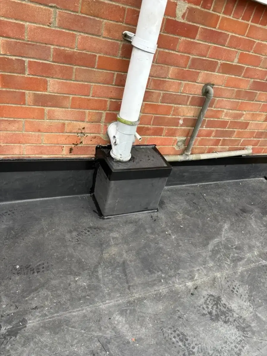 Completed flat roof extension featuring crisp white uPVC guttering and twin decorative skylight roof lanterns. Installed by Norfolk Exterior Solutions